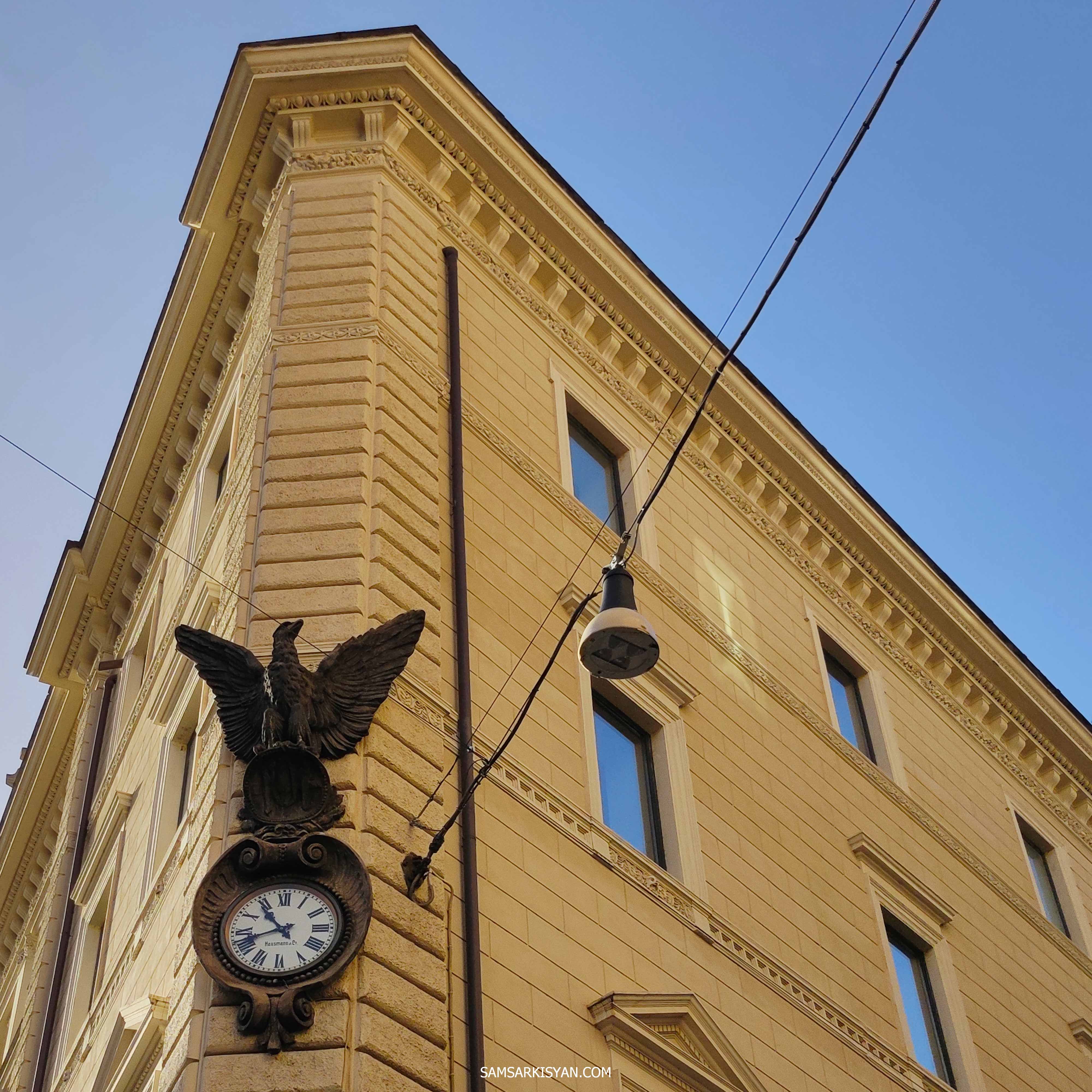 Decorations on the facades of a Roman buildings, wall clock